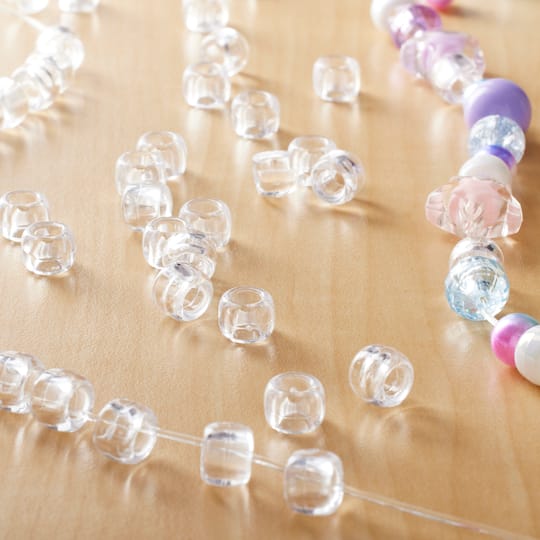 12 Packs: 580 ct. (6,960 total) Crystal Clear Pony Beads by Creatology™, 6mm x 9mm